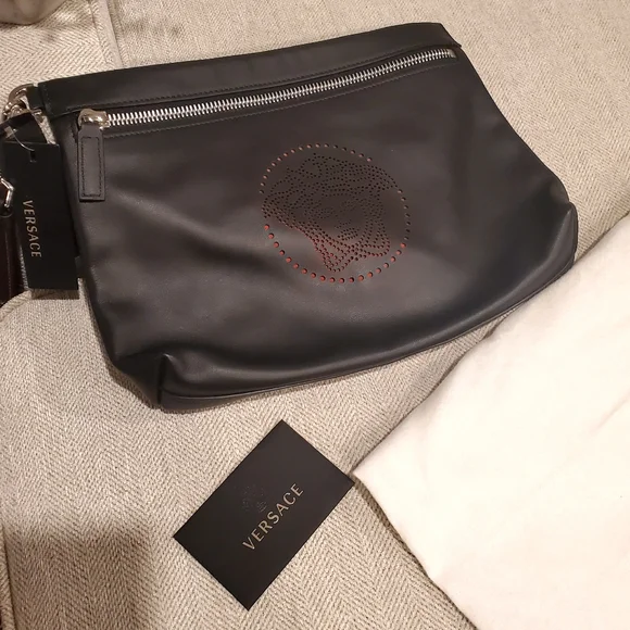Brand new Versace leather clutch wrislet